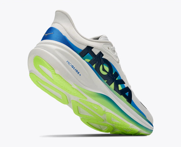 A Hoka running shoe in white, blue, and neon green, shown from a dynamic three-quarters angle against a light gray background.