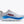 White running shoe with blue sole and Hoka branding on a white background