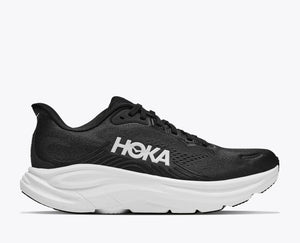 Black running shoe with blue and pink accents on a white background