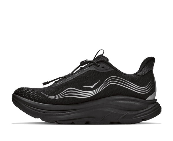 A black running shoe with a thick black sole and silver wavy stripe accents on the side,