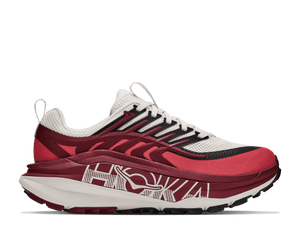 Burgundy and white trail running shoe on a white background