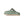 Light green and tan slingback clog on a white background