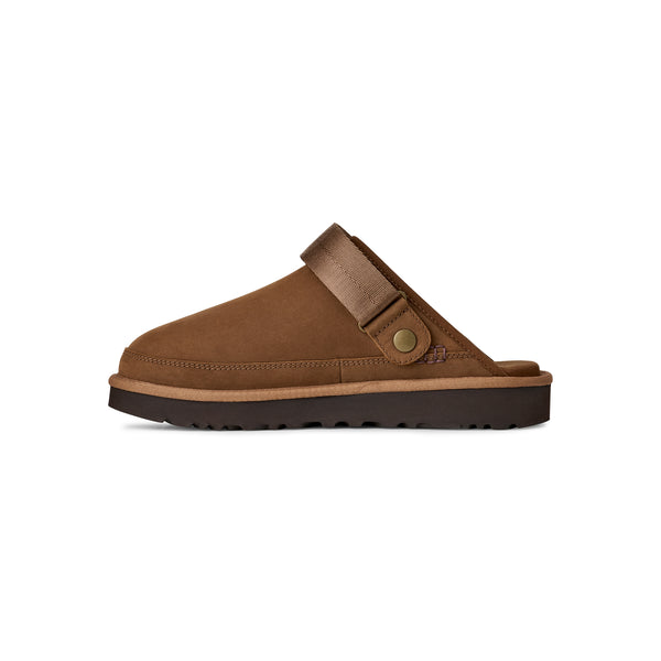 Slingback brown slipper clog on a white background