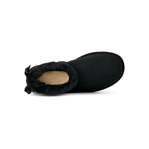 Black ankle length slipper boot with bow on the back  