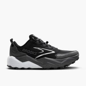 Black and white Brooks running shoe with white sole on a light gray background.
