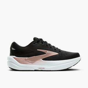 Black running shoe with rose gold accents on a white background
