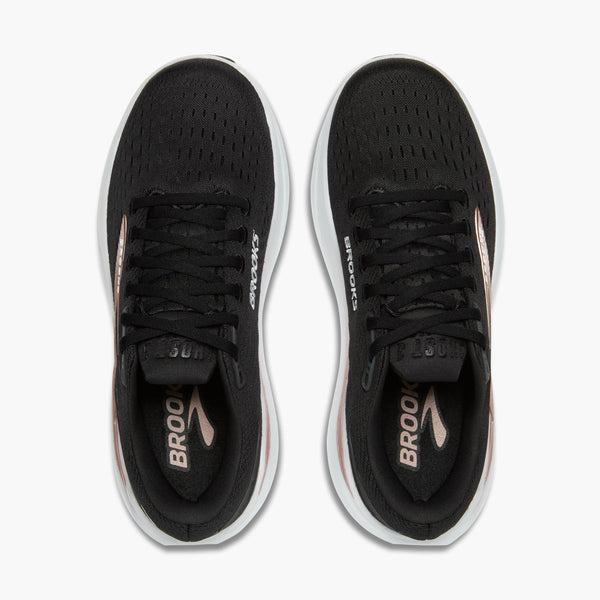 Black running shoes with white soles on a white background