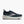Teal running shoe on a white background