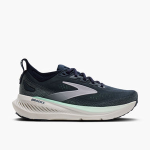 Teal running shoe on a white background