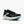 A black Brooks running shoe with a light blue and white sole, shown from a side profile on a light gray background.