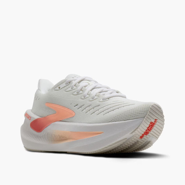 A peach ombre logo is in the middle of the upper on the lateral side