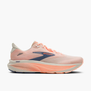Light melon colored women's running shoe with 'Brooks' branding on a white background