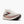 White running shoe with pink accents on a white background