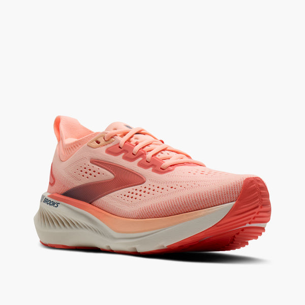Pink and coral unning shoe on a white background