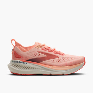 Pink running shoe with 'Brooks' branding on a white background