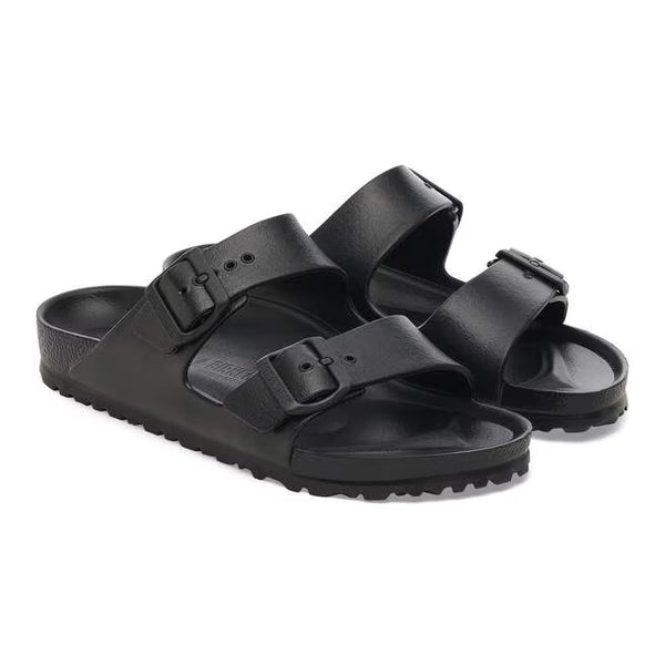 The upper of this shoe is two large straps with buckles on the lateral sides. 