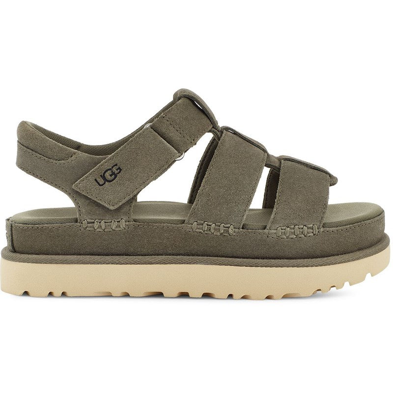 Lateral view of the Women's Goldenstar strap sandal by UGG in the color Moss Green
