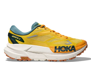 Yellow running shoe with Hoka branding on a white background