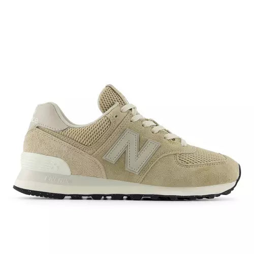 Tan and white sneaker on a white background