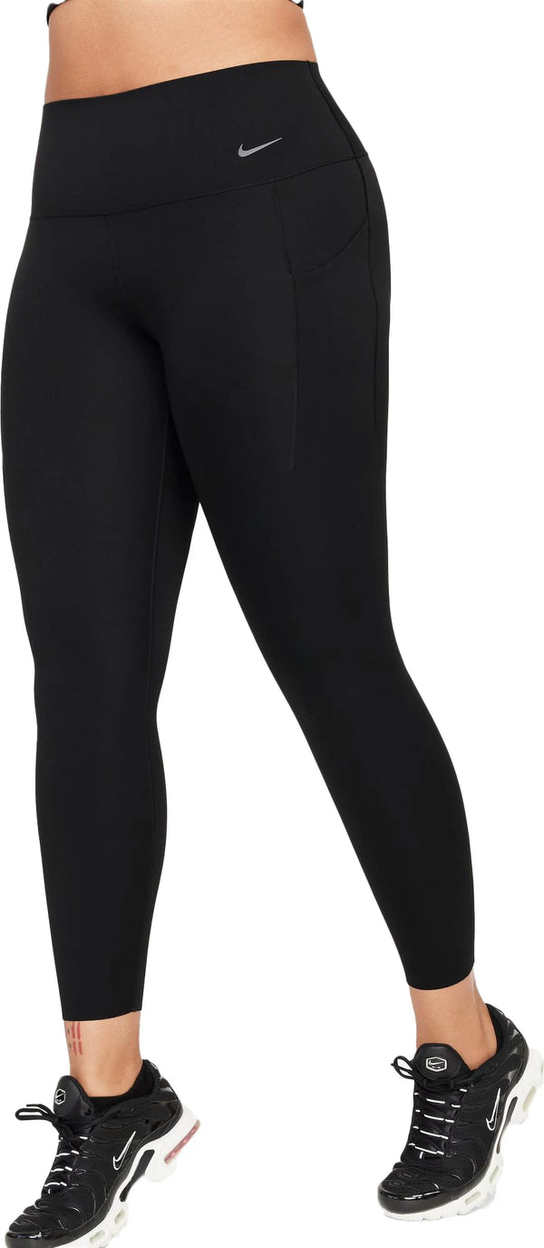 Black leggings with Nike logo worn by a person on a white background