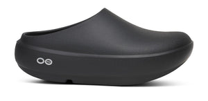 Black rubber clog on a white background