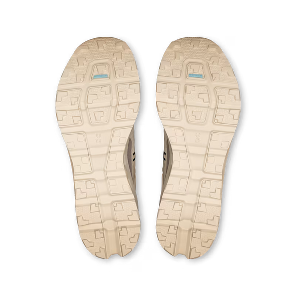 Beige shoe sole with tread pattern on a white background