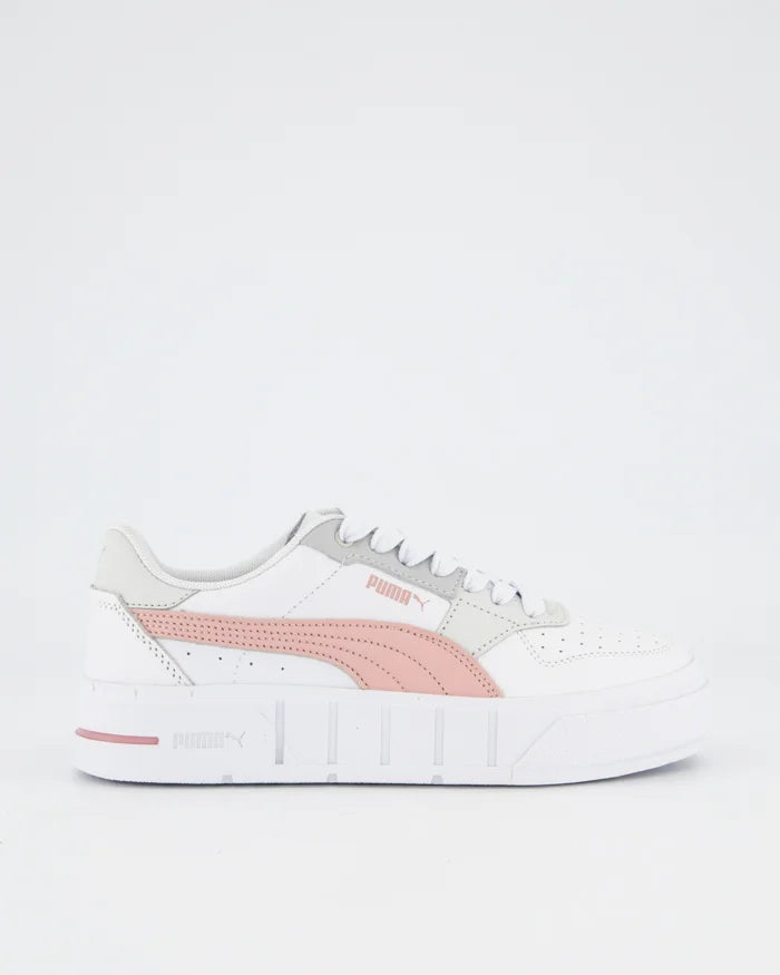 Meet the Women's PUMA Cali Court, your new favorite court classic. Standing at the intersection of sport, fashion, and streetwear, this sneaker brings the tennis vibes to any outfit and can be easily mixed and matched with other pieces to create an effortless look.