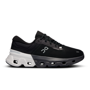 On Cloudflyer black and white On running shoes with a unique sole design.