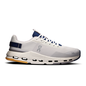 White running shoe with blue accents on a white background