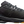 A black On running shoe with a textured mesh upper, black laces, a black midsole, and a contrasting brown outsole, on a white background.