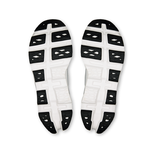 White shoe insoles with black grid pattern on a white background