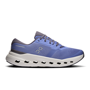 Blue men's running shoe with white sole on a white background and black laces.
