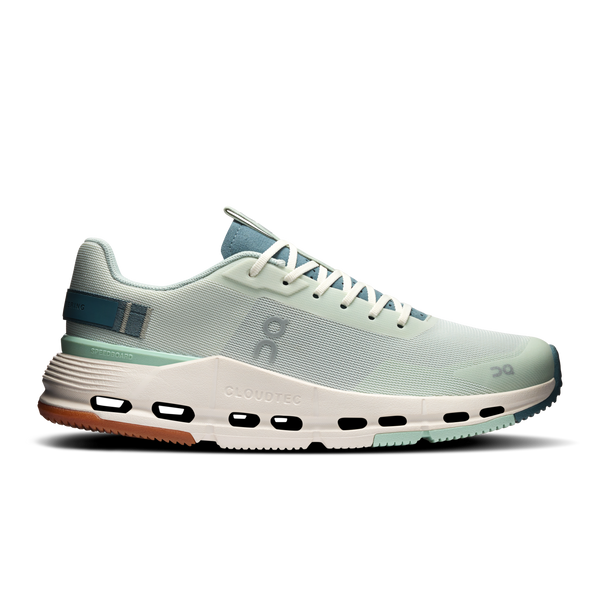 Light green running shoe with white sole on a white background