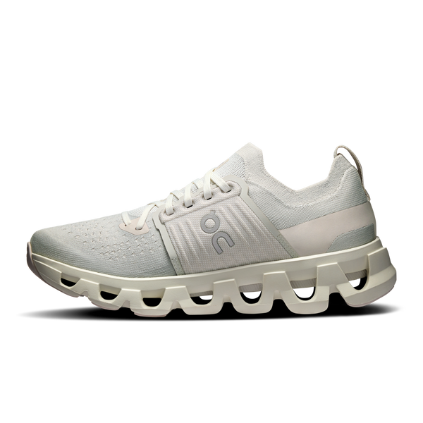 White running shoe with unique sole design on a white background