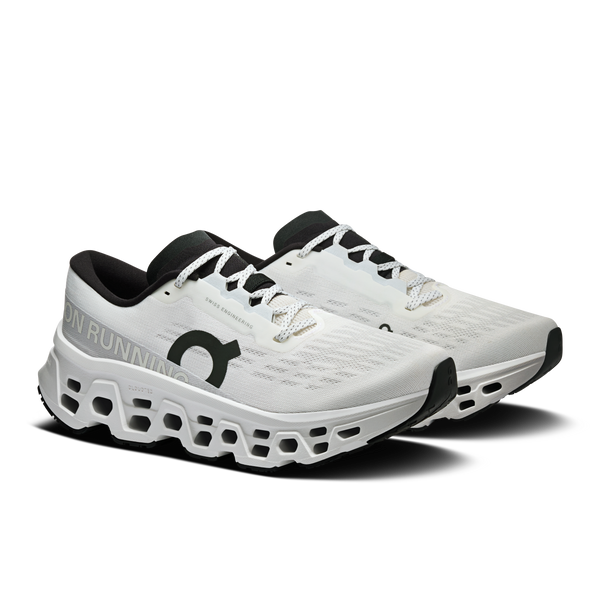 White running shoes with black accents on a white background