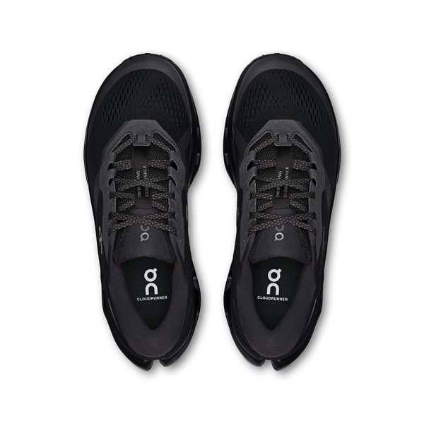 Black running shoes with 'on' branding on a white background