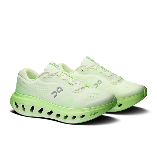 Lime green ombre running shoe on a white background