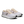 Light purple, cream and white training shoe on a white background