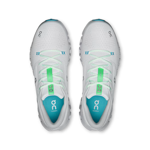 A pair of white POC Cloud-8 running shoes shown from a top-down view, featuring bright green laces and teal accents on the tongue and insole.