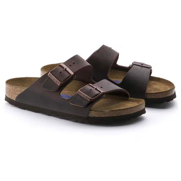 The oiled leather upper of this Arizona is deep brown and has brass buckles.  