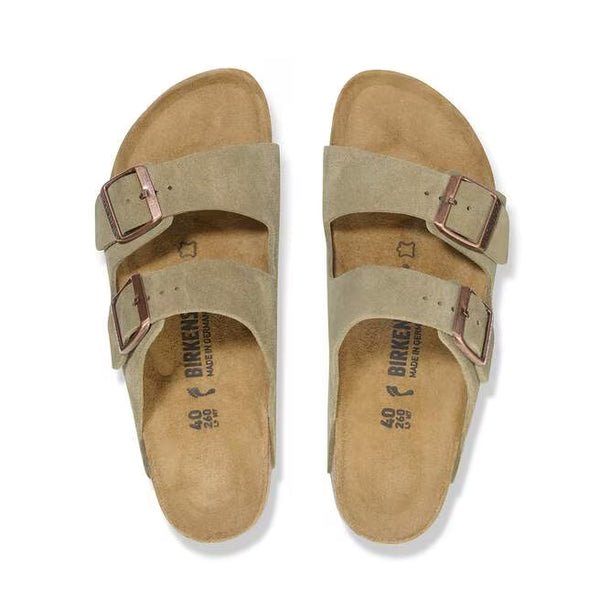 The upper of this shoe is two large straps with buckles on the lateral sides. 
