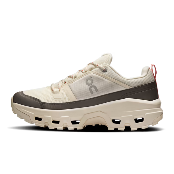 White and black sneaker with red accents on a transparent background
