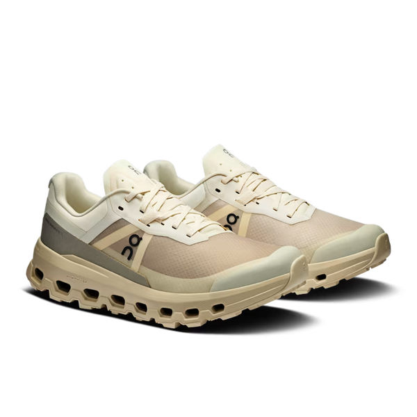 Beige running shoes with white soles on a transparent background