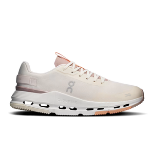 A side profile view of an On Cloudtec running shoe in off-white and light pink, featuring a breathable mesh upper, cushioned CloudTec sole, and pink accents on the laces and heel.
