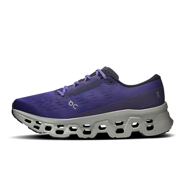 Purple running shoe with a white sole on a white background