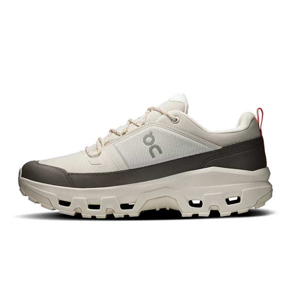 Grey and cream hiking shoe on a white background