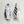 A pair of men's adidas shoes sitting at 2 differnet angles.