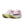 White running shoe with purple and green accents on a white background