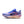 The medial side of a purple and blue running shoe with Nike logo on a white background