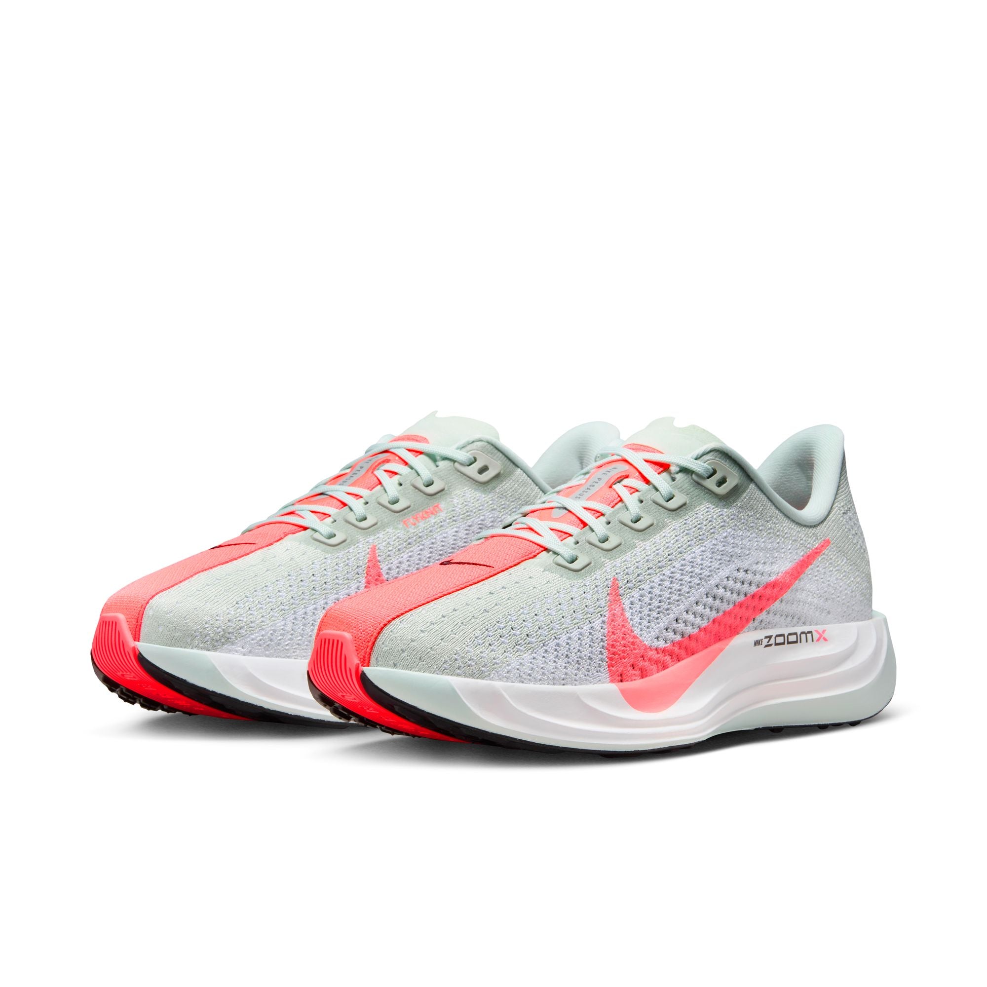 The Nike Pegasus Plus has a ht punch colored strip that runs over teh top of the shoe.  It matches the Swoosh color